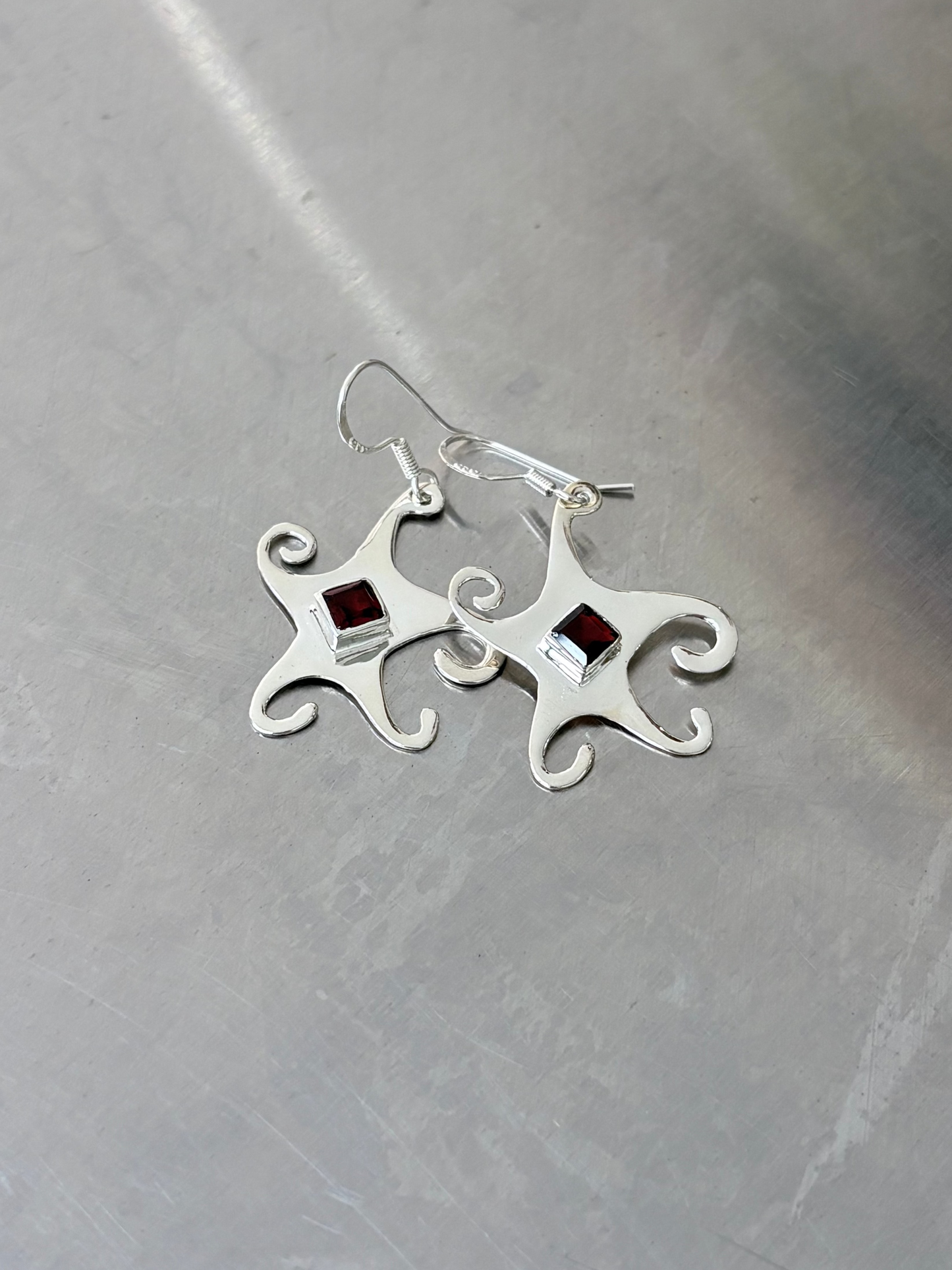 Garnet Whimsical Star earrings